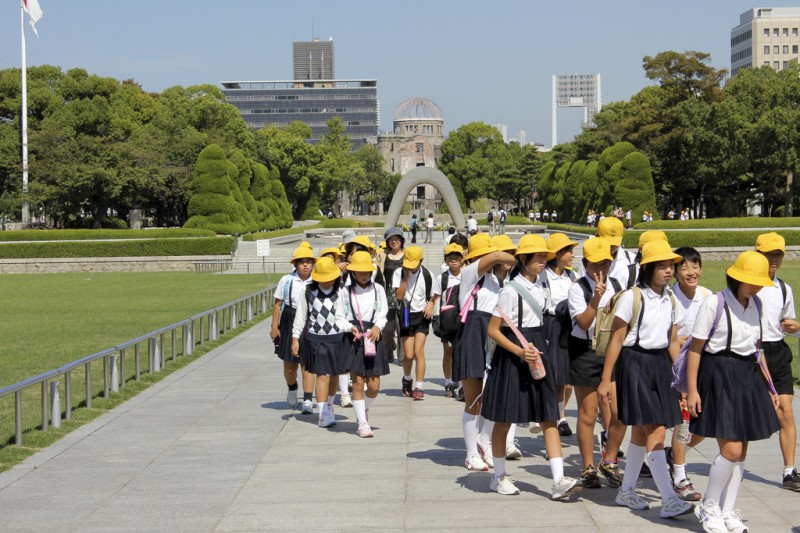 Many students visit Hiroshima for school trip. Photo taken at Hiroshia Peace Memorial Park by flickr user Magalie L'Abbé